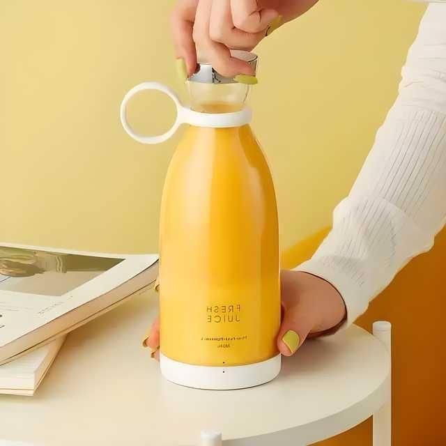 FreshPress™ Electric Mini Juicer – Portable & Powerful